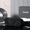 Chanel's iconic Classic Flap bag in black suede and chain Chanel's iconic Classic Flap bag in black suede and chain