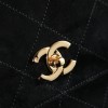 Chanel's iconic Classic Flap bag in black suede and chain Chanel's iconic Classic Flap bag in black suede and chain