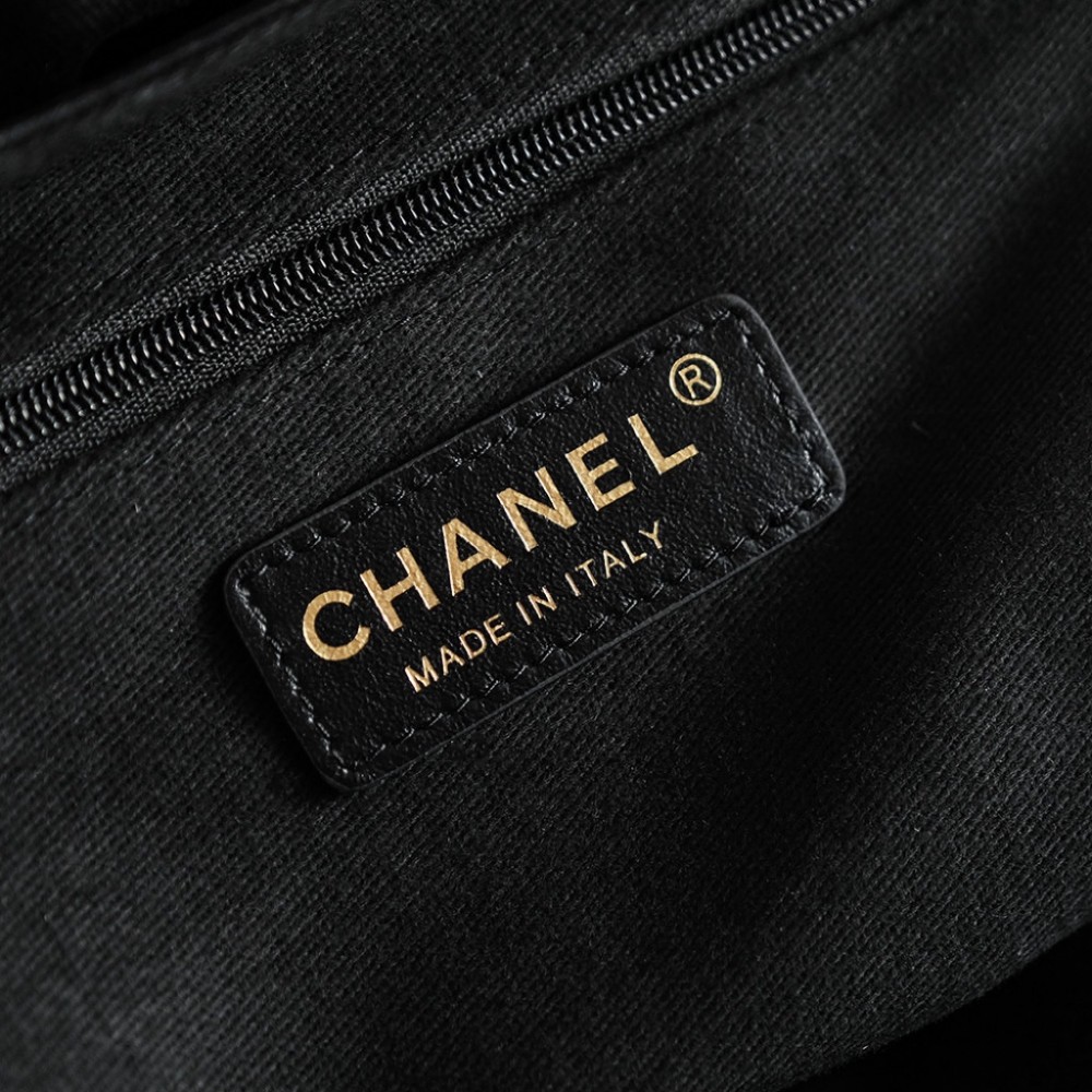 Chanel's iconic Classic Flap bag in black suede and chain Chanel's iconic Classic Flap bag in black suede and chain
