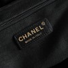 Chanel's iconic Classic Flap bag in black suede and chain Chanel's iconic Classic Flap bag in black suede and chain