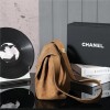 Chanel's iconic Classic Flap bag in brown suede and chain Chanel's iconic Classic Flap bag in brown suede and chain