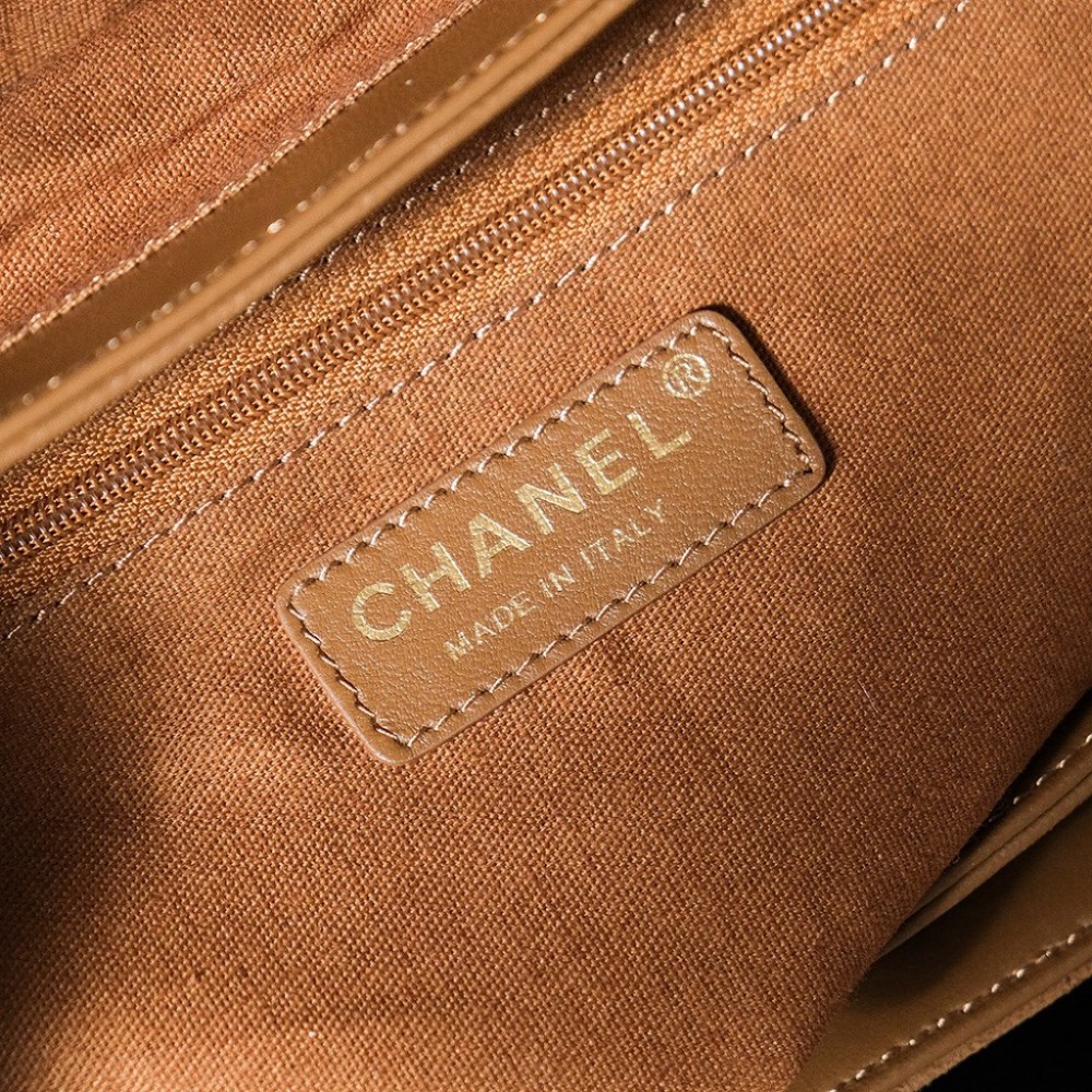 Chanel's iconic Classic Flap bag in brown suede and chain Chanel's iconic Classic Flap bag in brown suede and chain