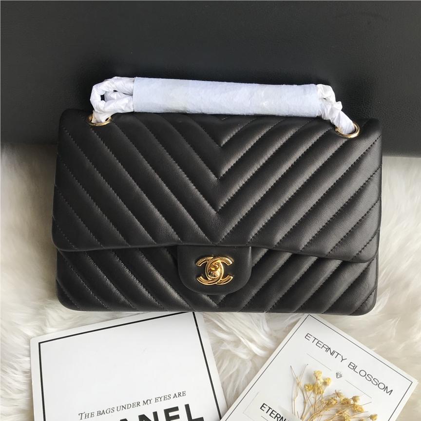 Chanel Boy Classic Flap Bag in Black Leather with Gold Lock Chain Chanel Boy Classic Flap Bag in Black Leather with Gold Lock Chain