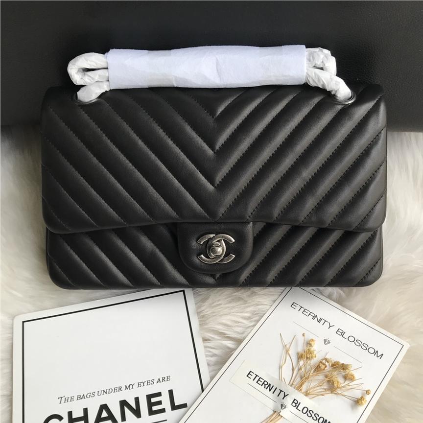Chanel Boy Classic Flap Bag in Black Leather with Silver Lock and Chain