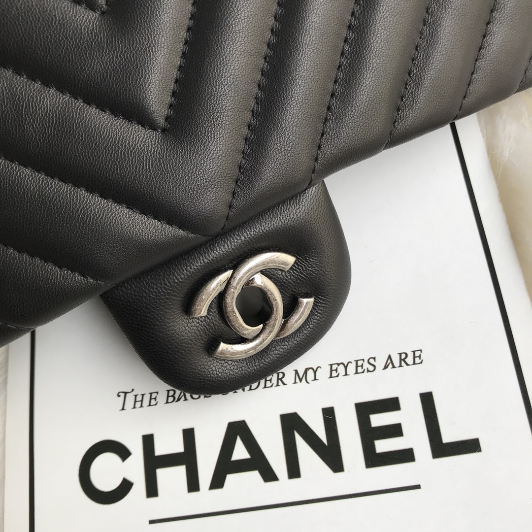 Chanel Boy Classic Flap Bag in Black Leather with Silver Lock and Chain