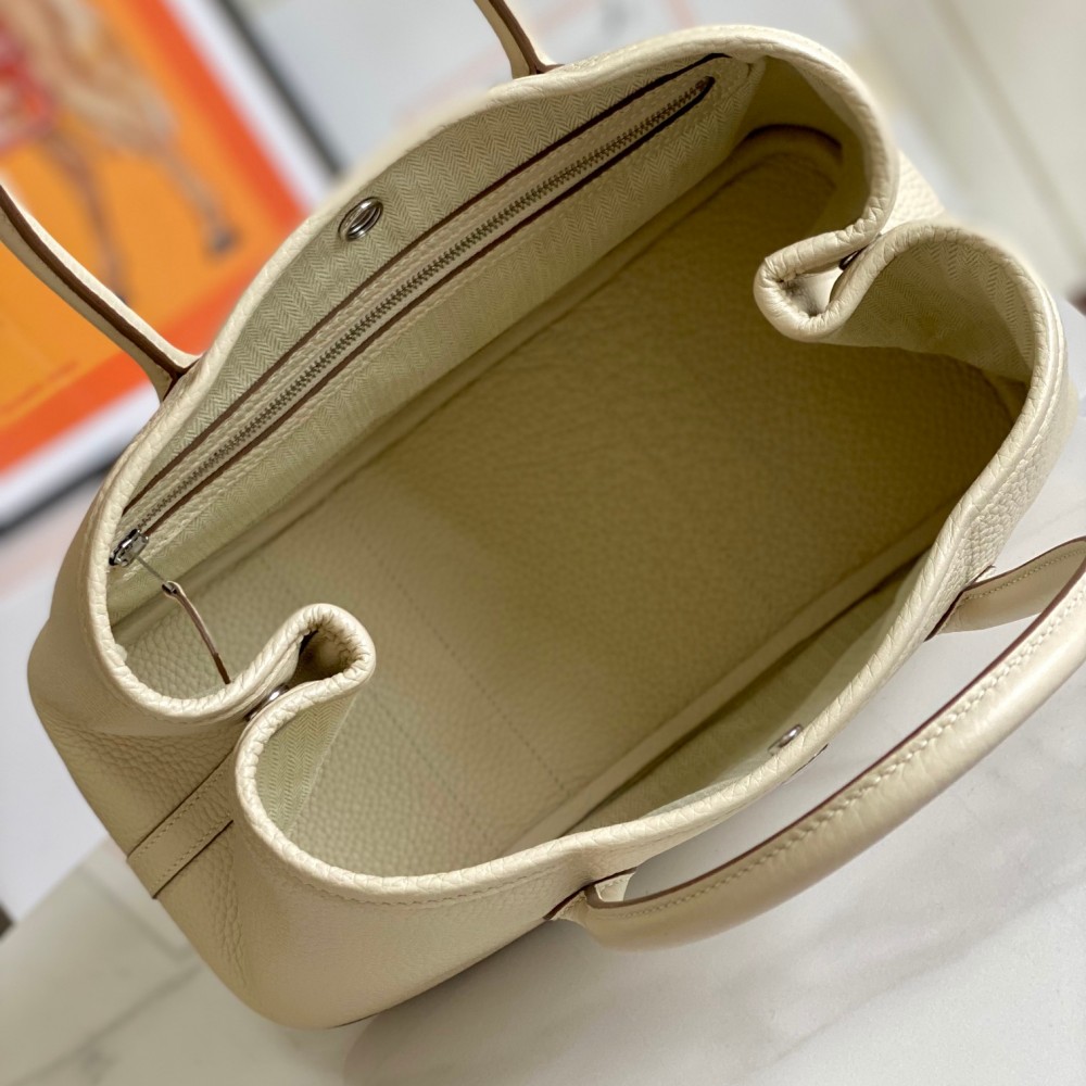 Hermès Kelly series pure white leather magnetic button handbag Hermès Kelly series pure white leather magnetic button handbag