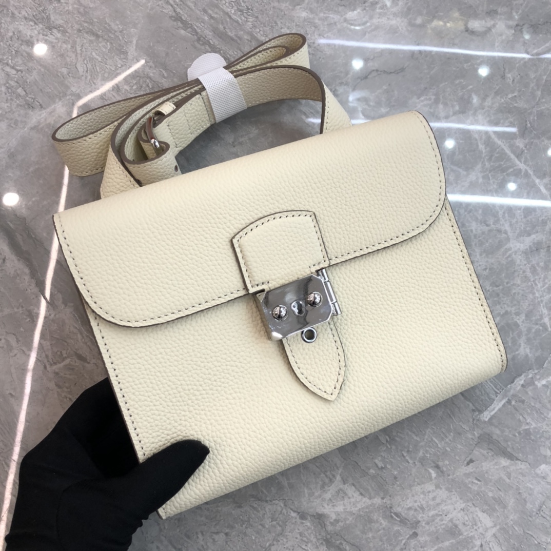 Hermès Roulis series genuine leather ivory grained pig nose bag Hermès Roulis series genuine leather ivory grained pig nose bag