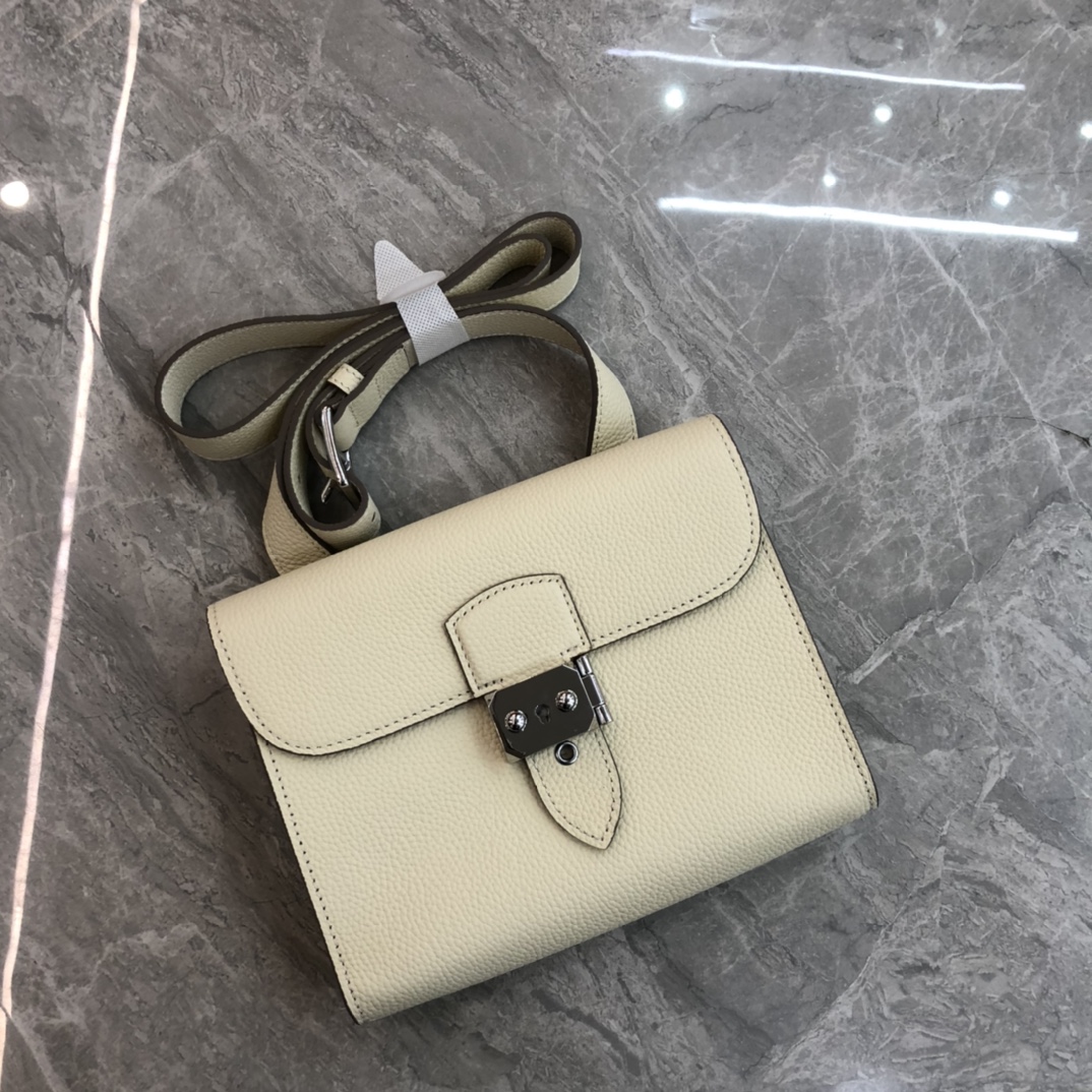 Hermès Roulis series genuine leather ivory grained pig nose bag Hermès Roulis series genuine leather ivory grained pig nose bag
