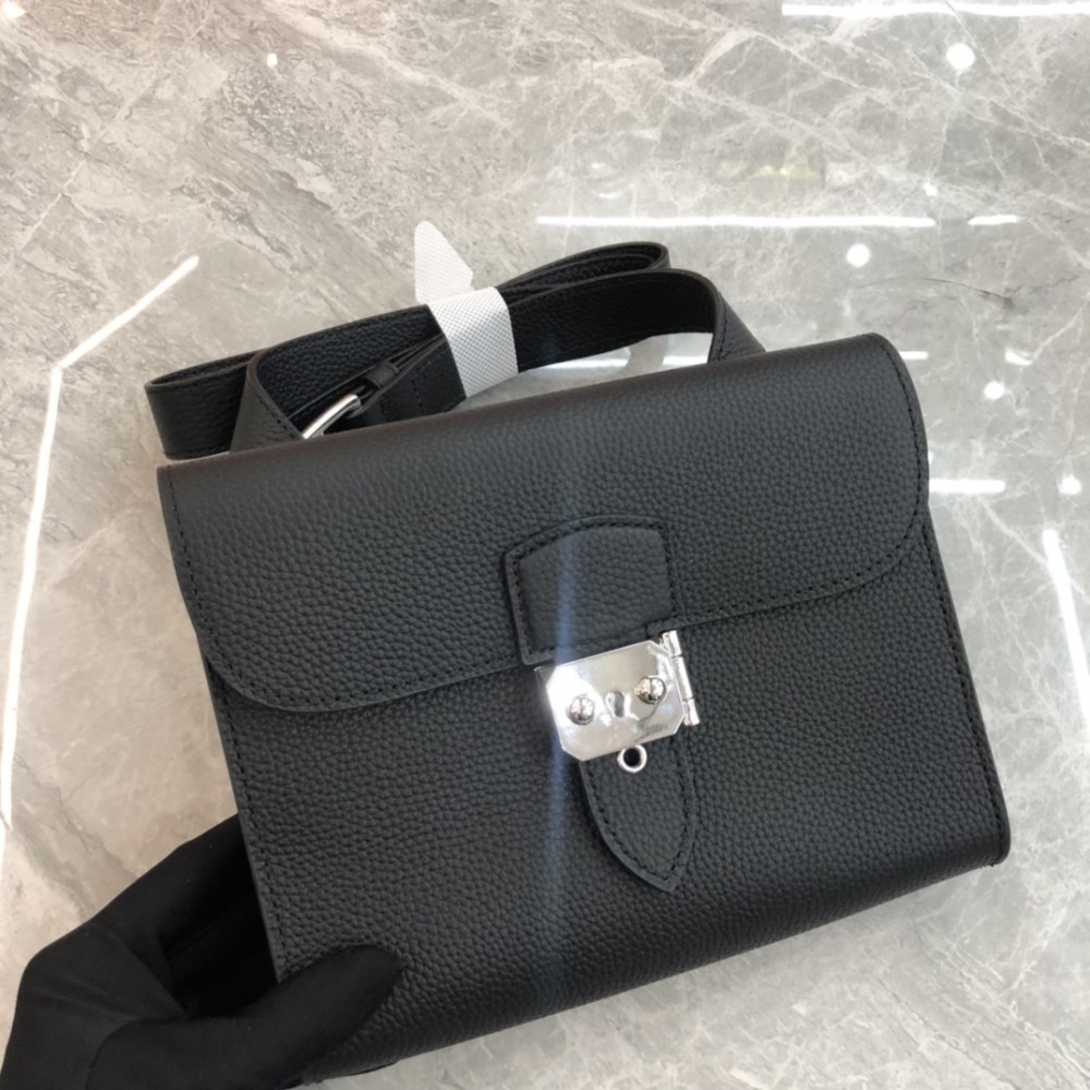 Hermès Roulis series pure black and white grain texture pig nose bag Hermès Roulis series pure black and white grain texture pig nose bag