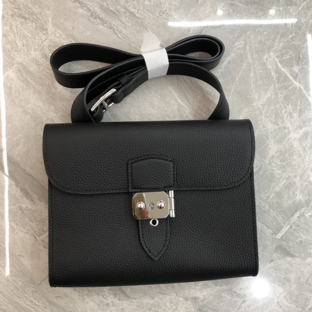 Hermès Roulis series pure black and white grain texture pig nose bag Hermès Roulis series pure black and white grain texture pig nose bag