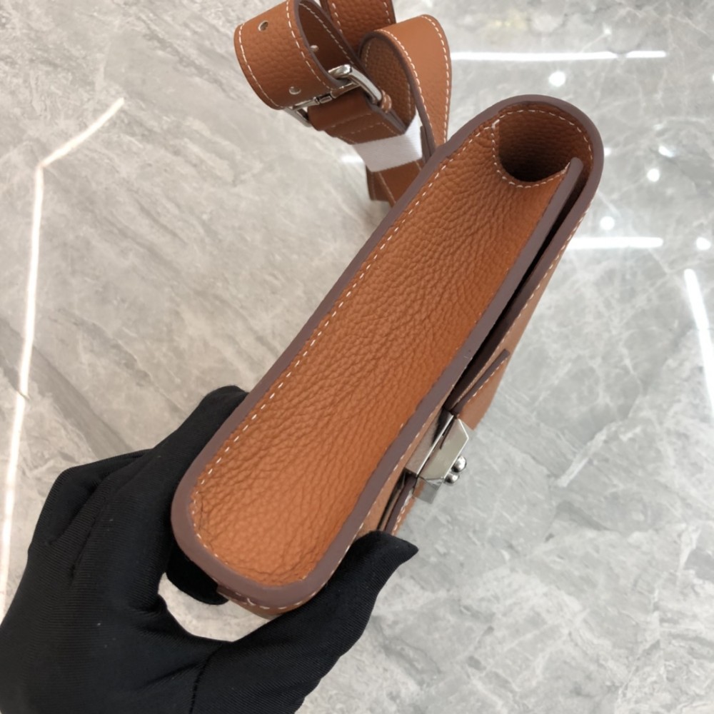 Hermès Roulis series true classic orange and white grain texture pig nose bag Hermès Roulis series true classic orange and white grain texture pig nose bag