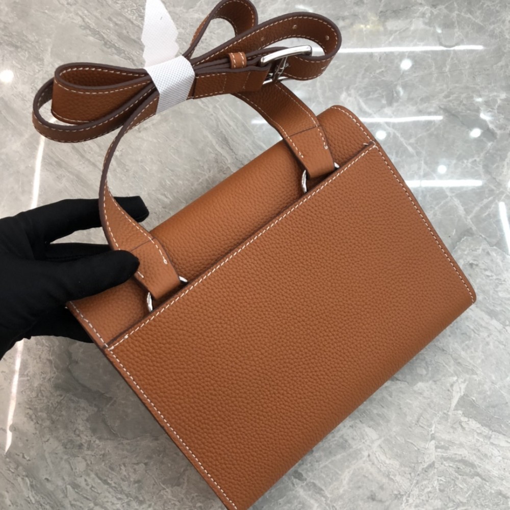 Hermès Roulis series true classic orange and white grain texture pig nose bag Hermès Roulis series true classic orange and white grain texture pig nose bag