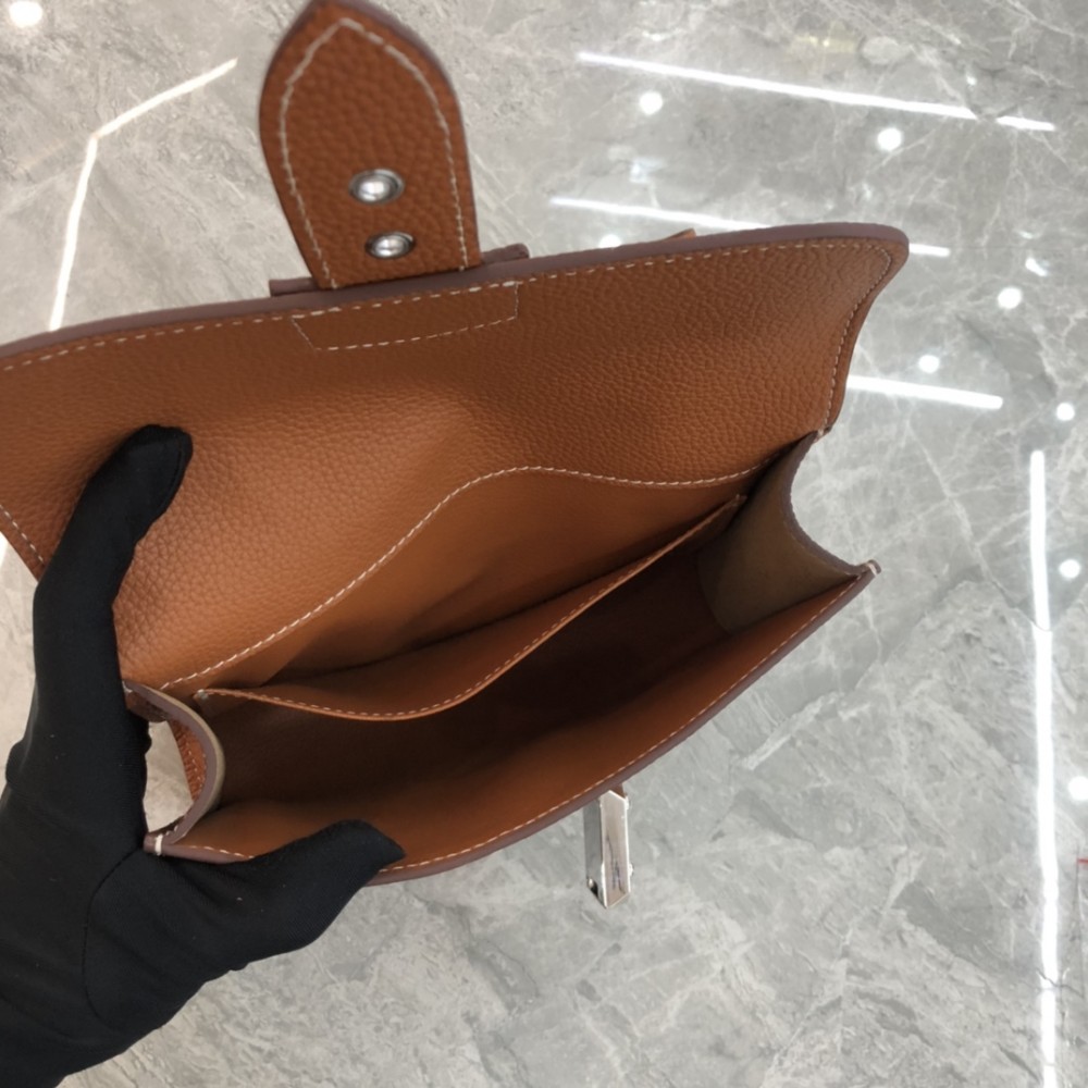 Hermès Roulis series true classic orange and white grain texture pig nose bag Hermès Roulis series true classic orange and white grain texture pig nose bag