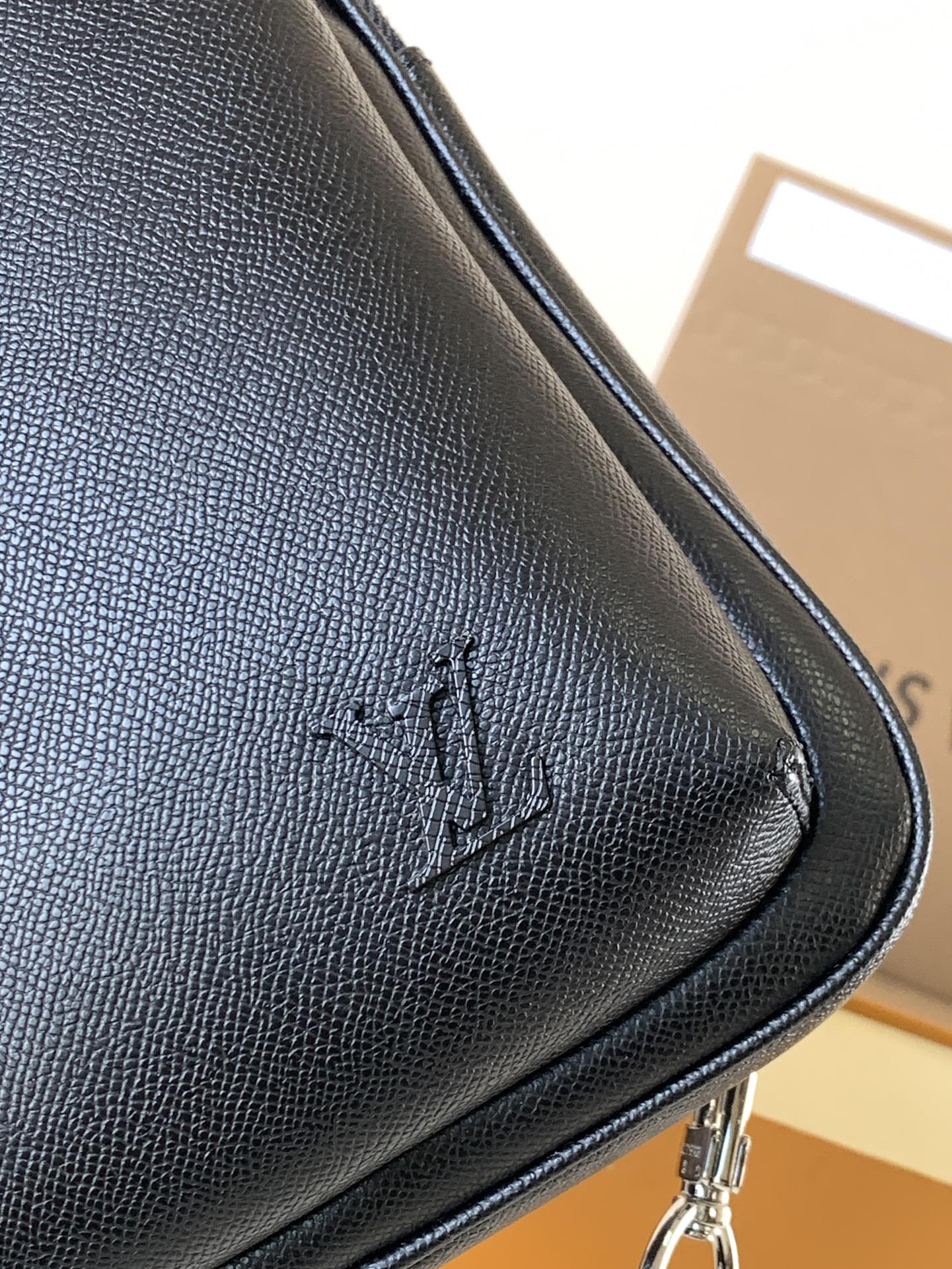 Louis Vuitton classic black textured leather chest bag Louis Vuitton classic black textured leather chest bag