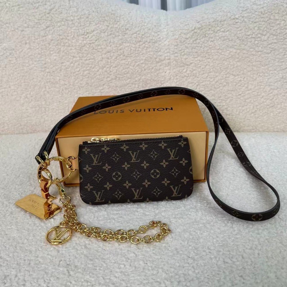 Louis Vuitton exquisite metal and leather phone holder