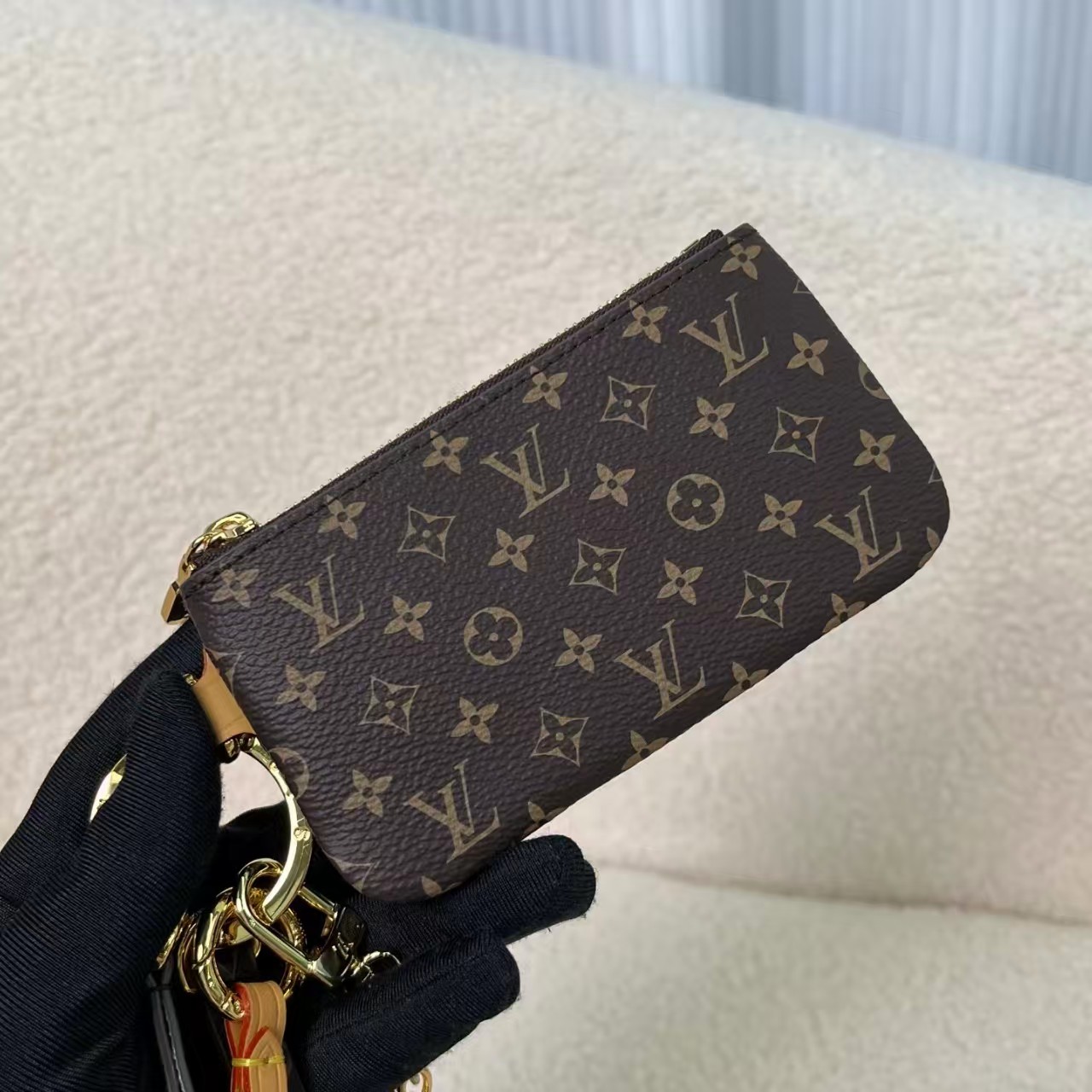 Louis Vuitton exquisite metal and leather phone holder