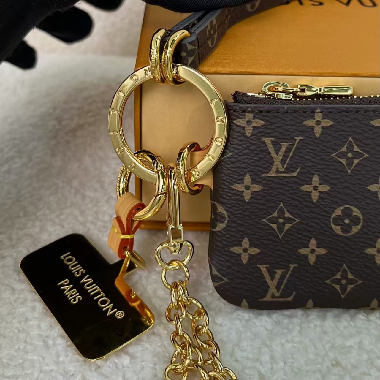 Louis Vuitton exquisite metal and leather phone holder