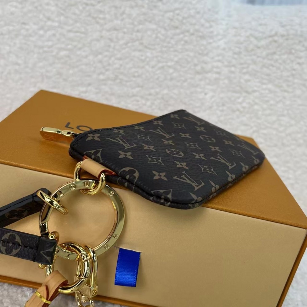 Louis Vuitton exquisite metal and leather phone holder