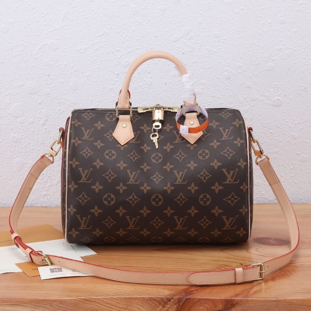 Louis Vuitton SPEEDY BANDOULIÈRE Medium Tote in Classic Canvas and Textured Leather Louis Vuitton SPEEDY BANDOULIÈRE Medium Tote in Classic Canvas and Textured Leather