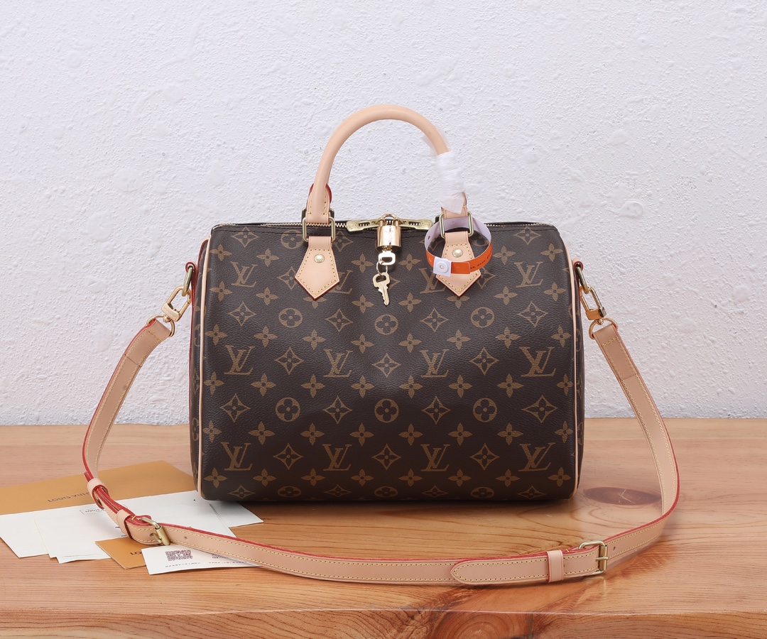 Louis Vuitton SPEEDY BANDOULIÈRE Medium Tote in Classic Canvas and Textured Leather Louis Vuitton SPEEDY BANDOULIÈRE Medium Tote in Classic Canvas and Textured Leather