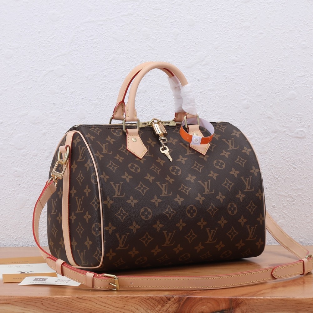 Louis Vuitton SPEEDY BANDOULIÈRE Medium Tote in Classic Canvas and Textured Leather Louis Vuitton SPEEDY BANDOULIÈRE Medium Tote in Classic Canvas and Textured Leather