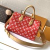Louis Vuitton SPEEDY red canvas textured tote bag Louis Vuitton SPEEDY red canvas textured tote bag