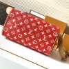 Louis Vuitton SPEEDY red canvas textured tote bag Louis Vuitton SPEEDY red canvas textured tote bag