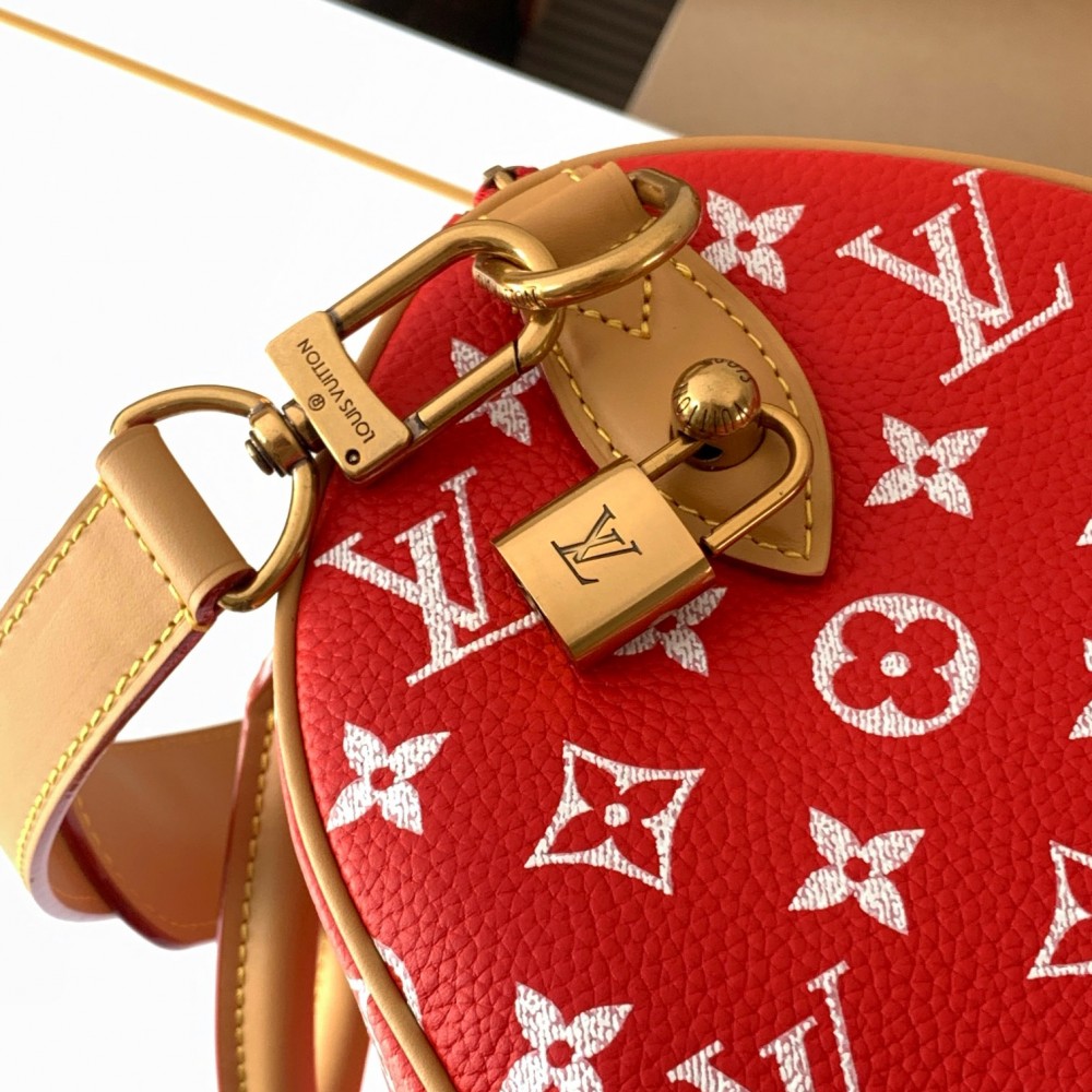 Louis Vuitton SPEEDY red canvas textured tote bag Louis Vuitton SPEEDY red canvas textured tote bag