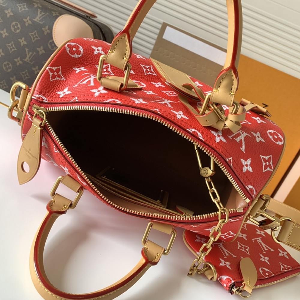 Louis Vuitton SPEEDY red canvas textured tote bag Louis Vuitton SPEEDY red canvas textured tote bag