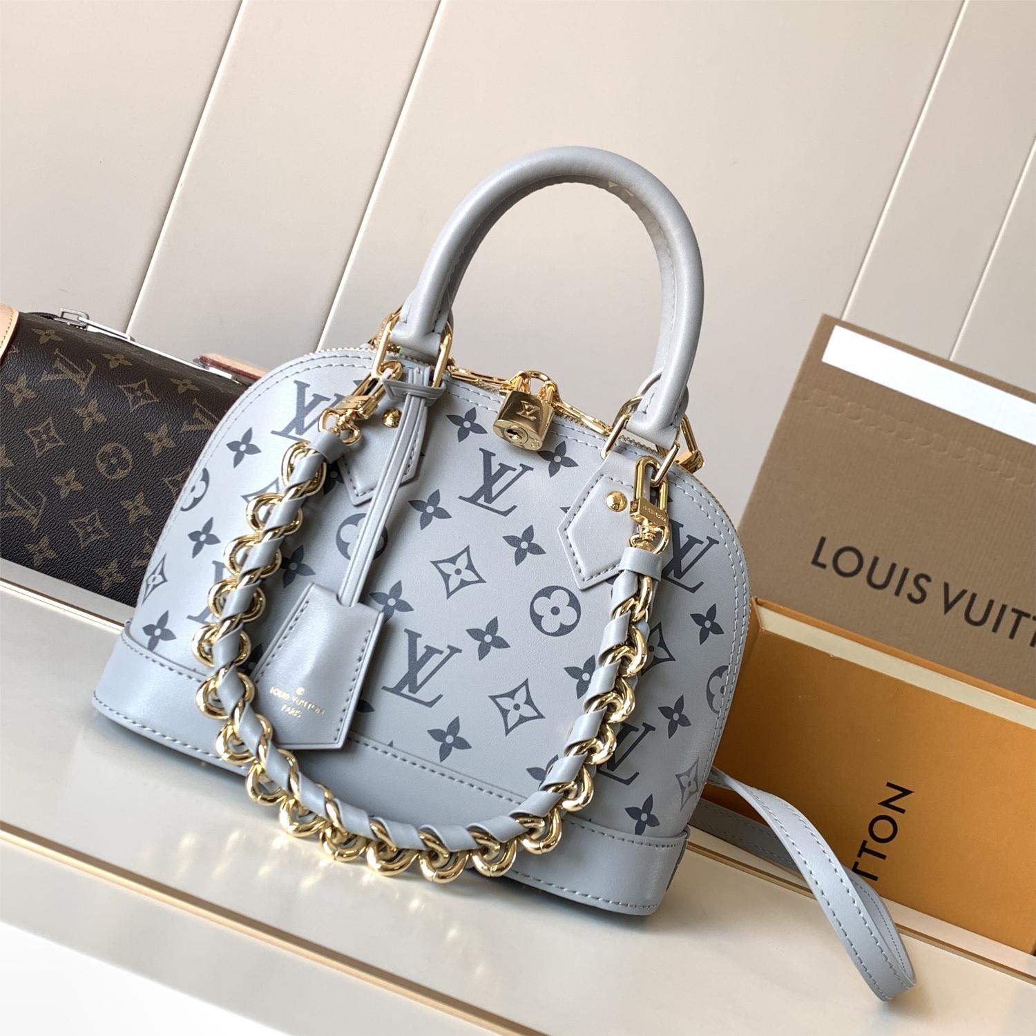 Louis Vuitton Speedy Small Blue Textured Canvas Tote Louis Vuitton Speedy Small Blue Textured Canvas Tote