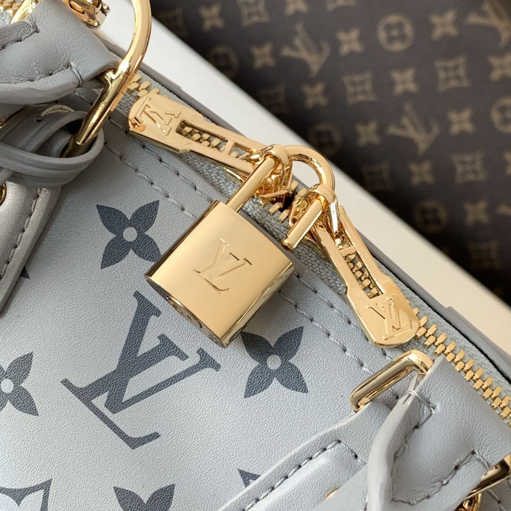 Louis Vuitton Speedy Small Blue Textured Canvas Tote Louis Vuitton Speedy Small Blue Textured Canvas Tote