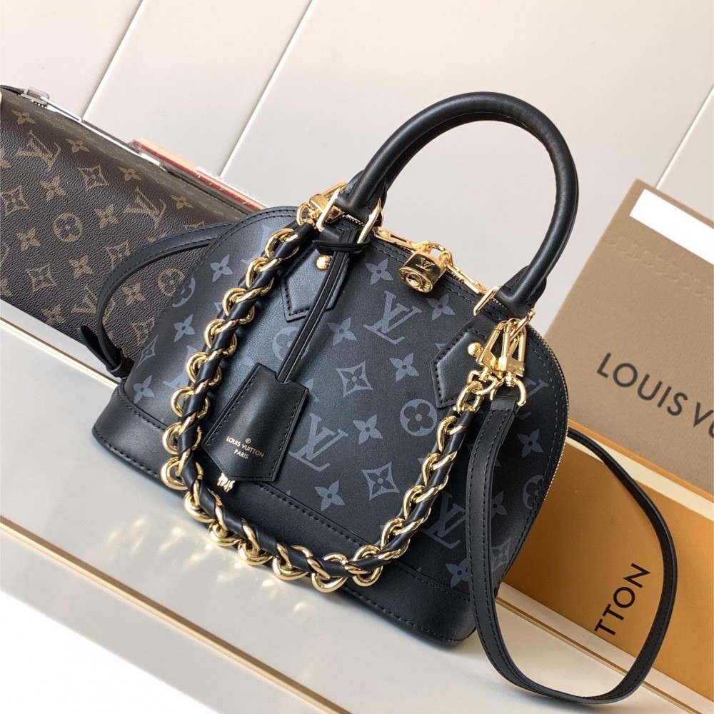 Louis Vuitton Alma Black Textured Canvas Tote Louis Vuitton Alma Black Textured Canvas Tote