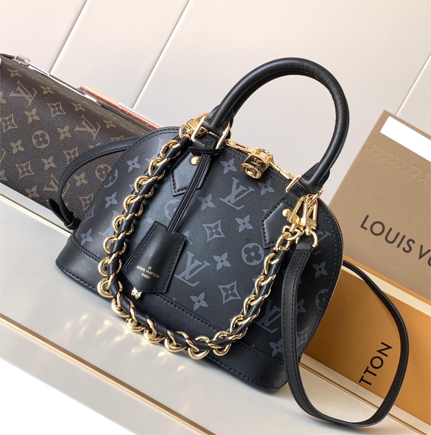 Louis Vuitton Alma Black Textured Canvas Tote Louis Vuitton Alma Black Textured Canvas Tote