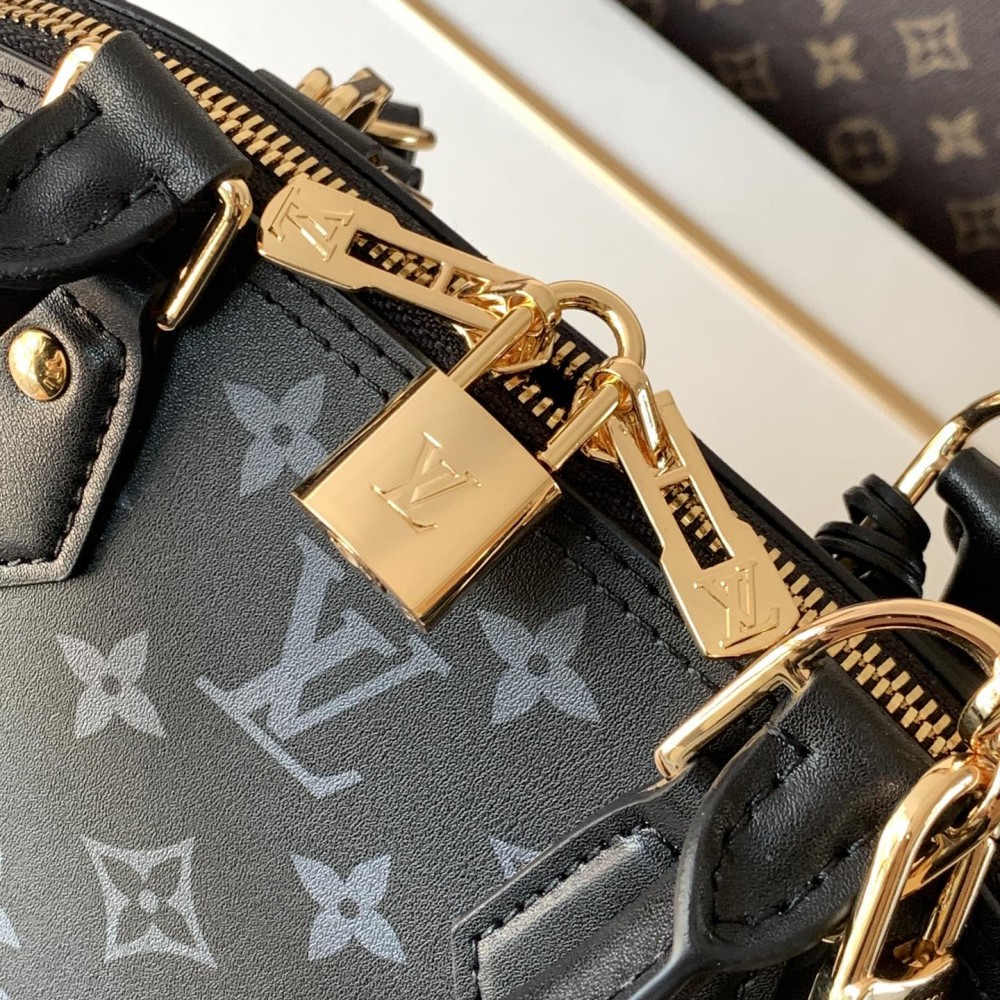 Louis Vuitton Alma Black Textured Canvas Tote Louis Vuitton Alma Black Textured Canvas Tote