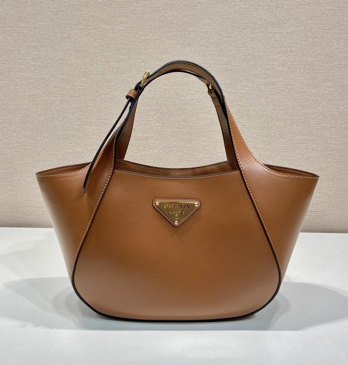 Prada Arqué naplak patent leather shoulder bag