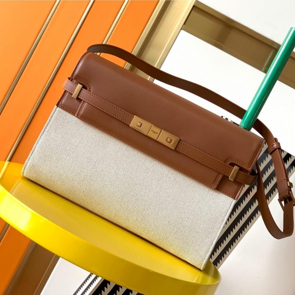 Saint Laurent Manhattan baguette with large logo and vintage leather flap Saint Laurent Manhattan baguette with large logo and vintage leather flap