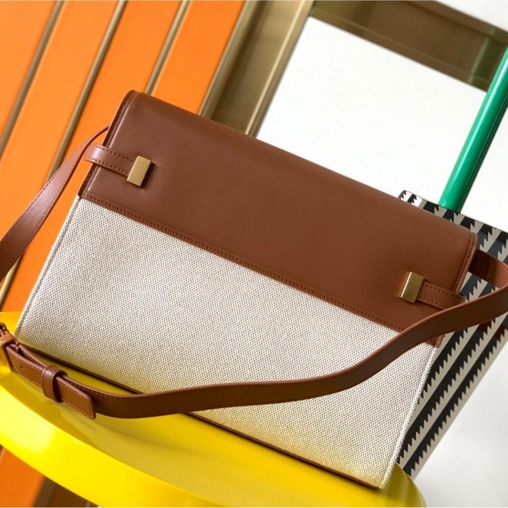 Saint Laurent Manhattan baguette with large logo and vintage leather flap Saint Laurent Manhattan baguette with large logo and vintage leather flap