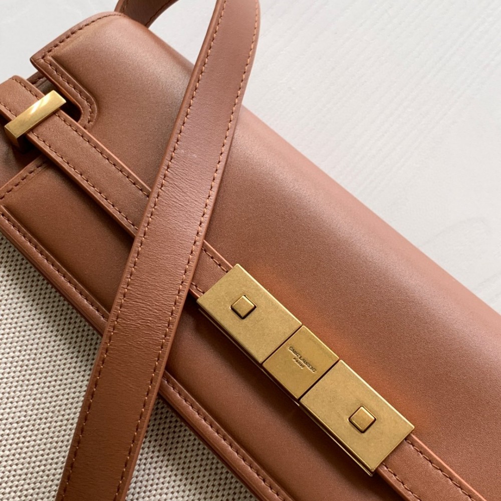 Saint Laurent Manhattan baguette with large logo and vintage leather flap Saint Laurent Manhattan baguette with large logo and vintage leather flap
