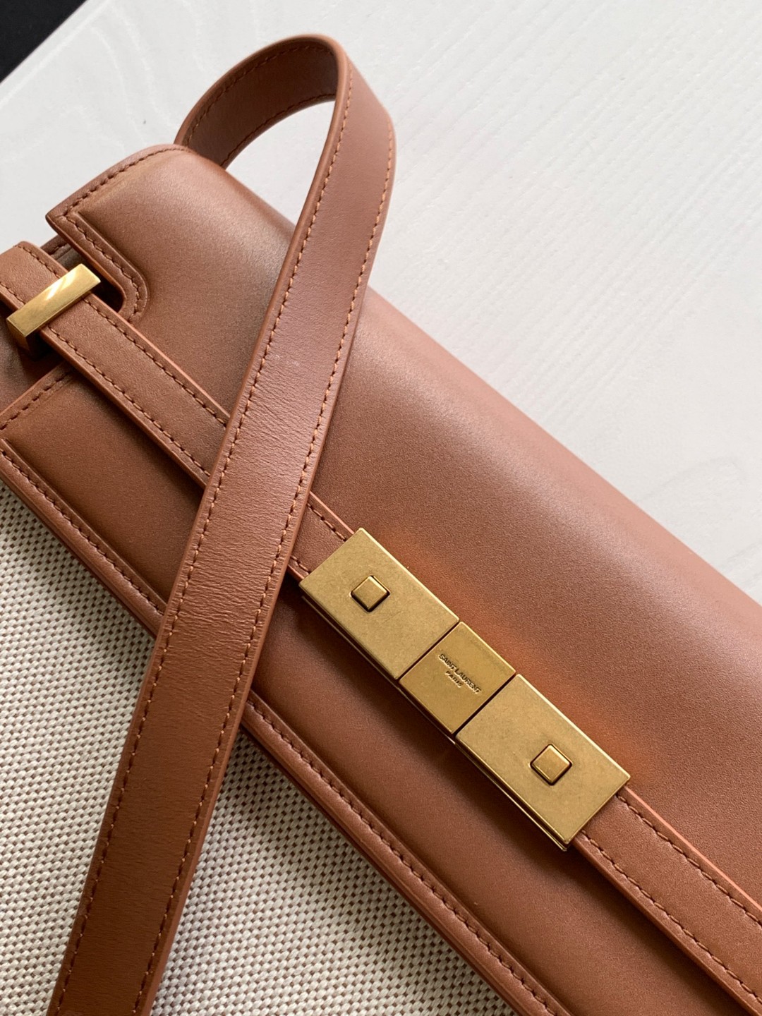 Saint Laurent Manhattan baguette with large logo and vintage leather flap Saint Laurent Manhattan baguette with large logo and vintage leather flap