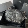 Saint Laurent Niki bag in grey and black grained lambskin. Saint Laurent Niki bag in grey and black grained lambskin.