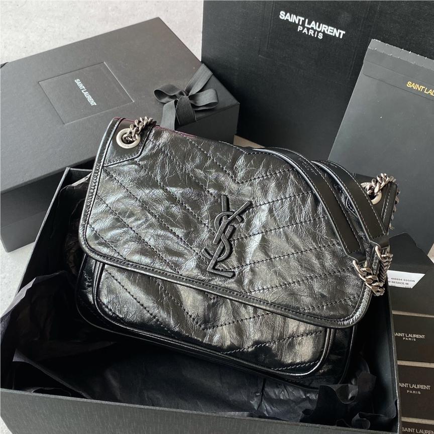 Saint Laurent Niki bag in grey and black grained lambskin. Saint Laurent Niki bag in grey and black grained lambskin.