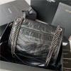 Saint Laurent Niki bag in grey and black grained lambskin. Saint Laurent Niki bag in grey and black grained lambskin.