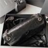 Saint Laurent Niki bag in grey and black grained lambskin. Saint Laurent Niki bag in grey and black grained lambskin.