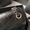 Saint Laurent Niki bag in grey and black grained lambskin. Saint Laurent Niki bag in grey and black grained lambskin.